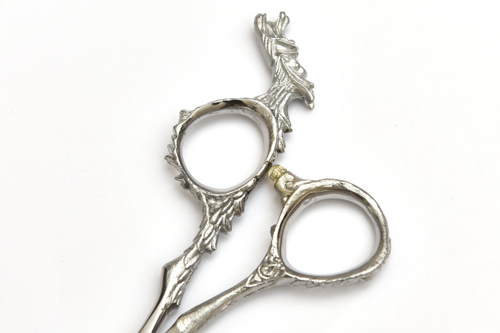 Ornate Silver Shears with Red Gem Leaf Handle